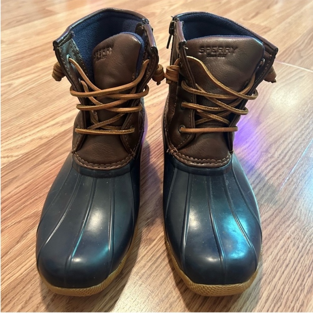 Navy and brown Sperry saltwater duck boots